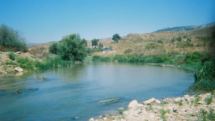 An archival view of the Litani River flowing through a valley in southern Lebanon, which currently marks the geographic boundary of the military buffer zone targeted by the advancing Israeli army.