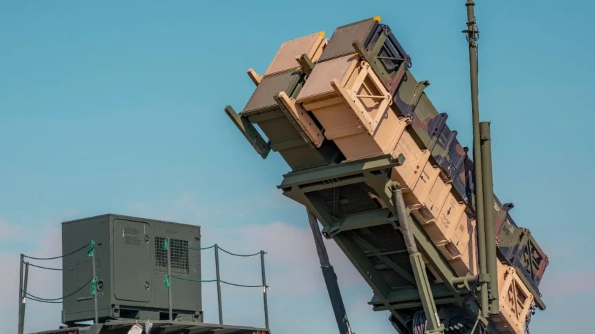 A U.S. Army Patriot missile launcher positioned against a clear sky, representing the advanced air defense systems used in Eastern Europe.