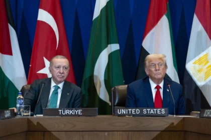 Archive photo of U.S. President Donald Trump and Turkish President Recep Tayyip Erdoğan sitting together at a multilateral meeting, representing the May 2026 diplomatic standoff over the Abraham Accords ultimatum.