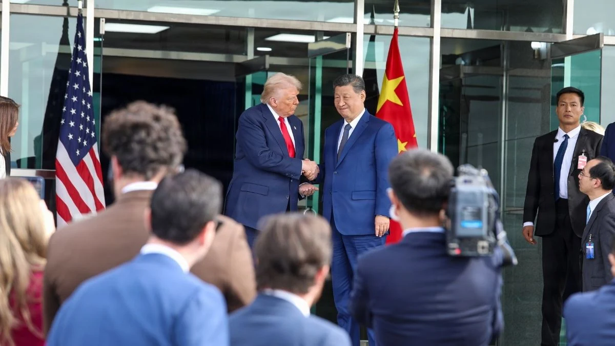 US President Donald Trump and Chinese President Xi Jinping shaking hands, representing the complex diplomatic and trade relationship between the two nations.