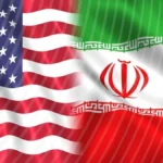 US and Iran flags side by side representing the ongoing peace negotiations over the Strait of Hormuz in May 2026