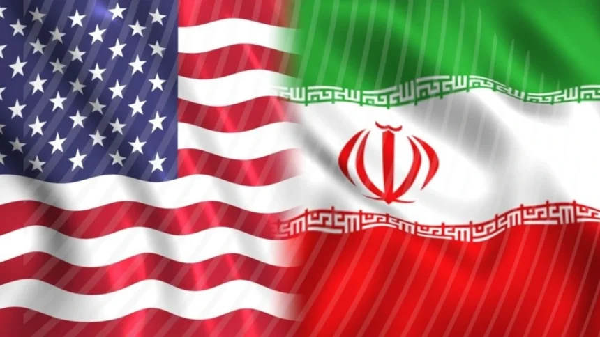 US and Iran flags side by side representing the ongoing peace negotiations over the Strait of Hormuz in May 2026
