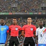 Match officials including Somali referee Omar Abdulkadir Artan (third from left) before the DR Congo vs Guinea quarterfinal at AFCON 2024, Abidjan