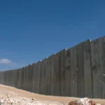 Concrete section of Israel's separation barrier cutting through the occupied West Bank