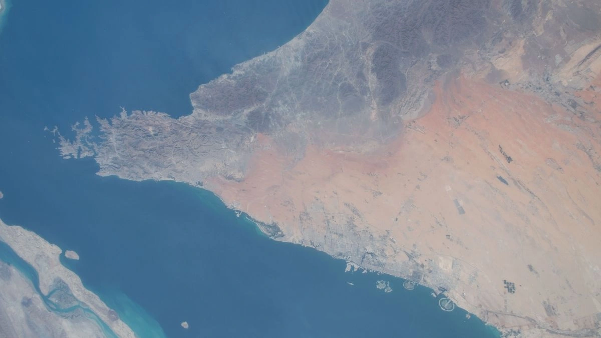Satellite view of the Strait of Hormuz and the Persian Gulf, the critical maritime chokepoint for global trade.