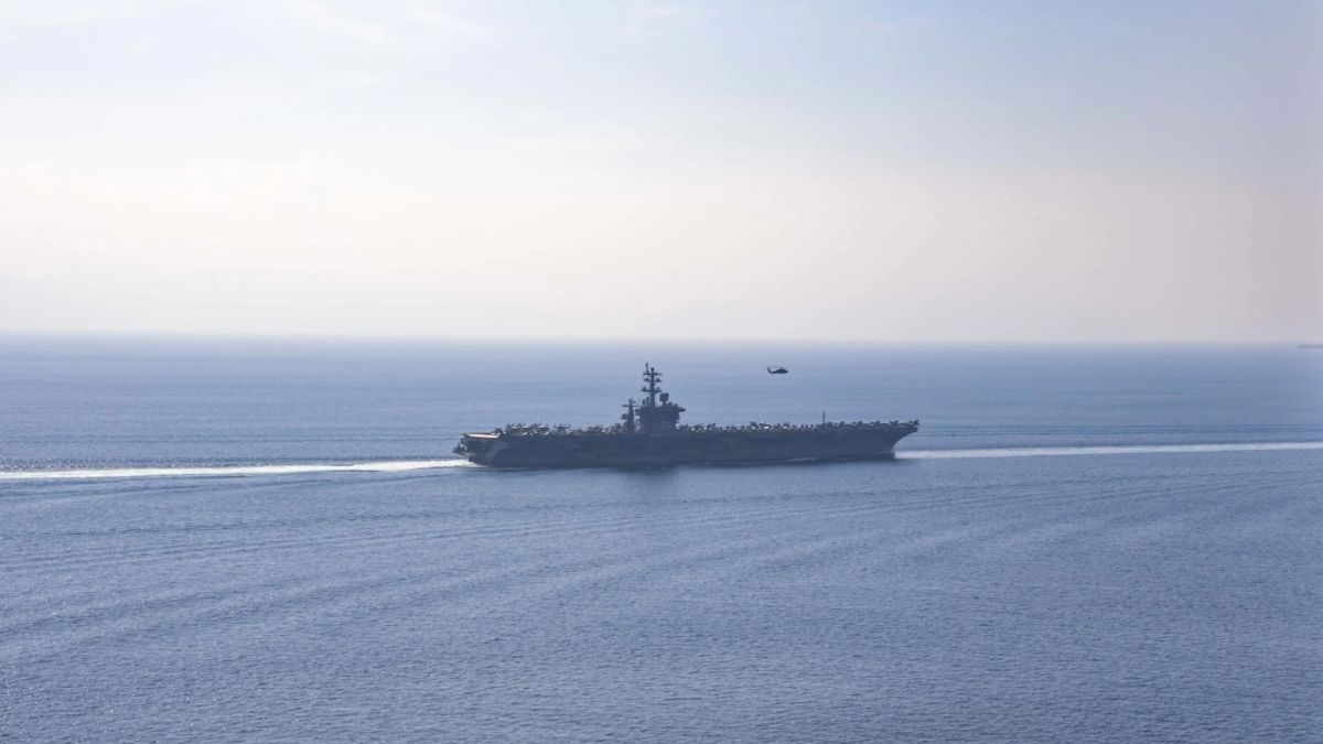 Aircraft carrier USS Dwight D. Eisenhower sailing through the Strait of Hormuz